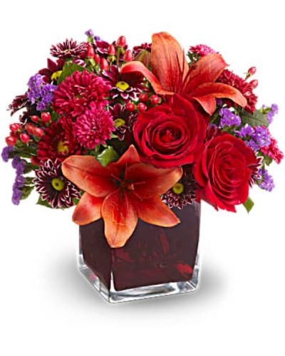 <div id="mark-3" class="m-pdp-tabs-marketing-description">Roses, lilies and asters in precious gemstone colors of garnet are nestled into a richly colored plum glass cube vase, creating a graceful presentation. Purple chrysanthemums and seafoam statice add a special touch. A beautiful bouquet for any occasion!</div>
&nbsp;
<div id="desc-3">Red roses, Asiatic lilies, Matsumoto asters and hypericum; purple daisy spray chrysanthemums and seafoam statice are delivered in a cube vase.</div>