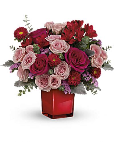 <ul id="tabs-pdp" class="nav nav-tabs" data-tabs="tabs"></ul>
<div id="tabs-pdp-content" class="tab-content">
<div id="description" class="tab-pane fade active" role="tabpanel" aria-labelledby="descriptionTab">
<div id="mark-3" class="m-pdp-tabs-marketing-description">A loving bunch, indeed! Show them you care with high-fashion hot pink roses in a bold crimson glass cube that's also a cool candleholder!</div>
<p>&nbsp;</p>
<div id="desc-3">This bold bouquet features hot pink roses, pink spray roses, red alstroemeria, red matsumoto asters, pink sinuata statice, dusty miller and spiral eucalyptus.</div>
</div>
</div>