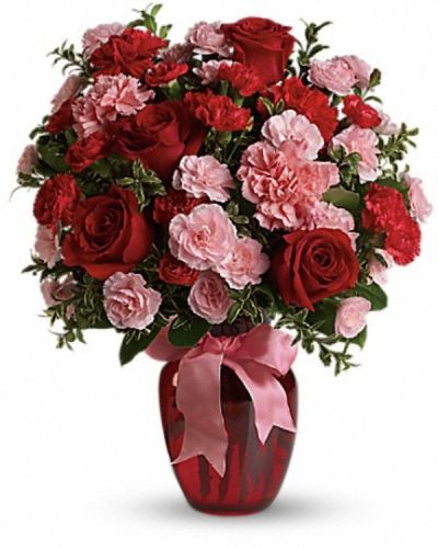 <div class="m-pdp-tabs-description">
<div id="mark-2" class="m-pdp-tabs-marketing-description">True romance will bloom brighter than ever when you surprise her with this dazzling bouquet of red roses, red carnations and other favorites in a chic ruby red vase. "Surprise" is the key word. That's when flowers mean the most.</div>
</div>
<p id="arrngDescp">This gorgeous bouquet includes red roses, red carnations, light pink carnations, red miniature carnations, light pink miniature carnations and green rhamnus accented with assorted greenery and a pink satin ribbon. Delivered in a ruby rose vase.</p>