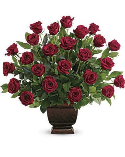 <div class="m-pdp-tabs-description">
<div id="mark-1" class="m-pdp-tabs-marketing-description">As true as the love symbolized by a red, red rose are the heartfelt memories and deep feelings embraced with this classic and elegant expression of tribute.</div>
</div>
<p id="arrngDescp">Two dozen red roses, accented by salal, are presented in a classic urn.</p>