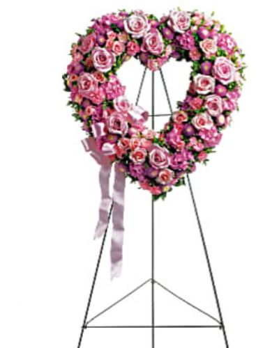 <div id="mark-1" class="m-pdp-tabs-marketing-description">In the shape of a heart, and accented with a pink satin ribbon, this garden of delicate blooms is a tender and classic tribute to a precious life, and a cherished expression of love and sympathy.</div>
<div id="desc-1">
<ul>
 	<li>Beautiful flowers such as light pink roses, hydrangea and miniature carnations mix with lavender chrysanthemums on an open heart-shaped wreath.</li>
</ul>
</div>