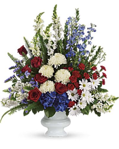 <div class="m-pdp-tabs-description">
<div id="mark-1" class="m-pdp-tabs-marketing-description">A dazzling display of patriotic red, white and blue flowers sends a silent yet poignant statement about hope, freedom and the strength to endure. This proud bouquet is a testament to life that is sure to be appreciated.</div>
</div>
<p id="arrngDescp">A beautiful mix of all-American red, white and blue flowers such as hydrangea, roses, miniature carnations, snapdragons, chrysanthemums and more are perfectly arranged in a white urn.</p>
