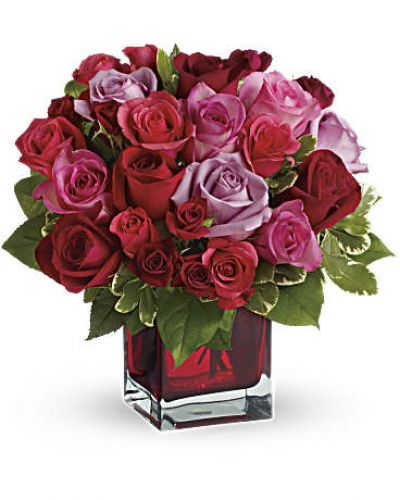 <p>Surprise her with roses in four gorgeous shades of love artistically arranged in a red contemporary cube. Imagine the look on her face when she opens the door and sees this ravishingly romantic bouquet. She'll fall in love with you all over again.</p>