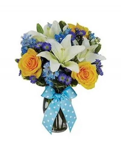 The gorgeous white Asiatic lilies grab your attention right away, but they only begin to tell the story of this uniquely beautiful bouquet also boasting yellow roses, blue delphinium and purple Monte Casino blooms all creatively arranged in a fluted vase with a blue satin ribbon.
